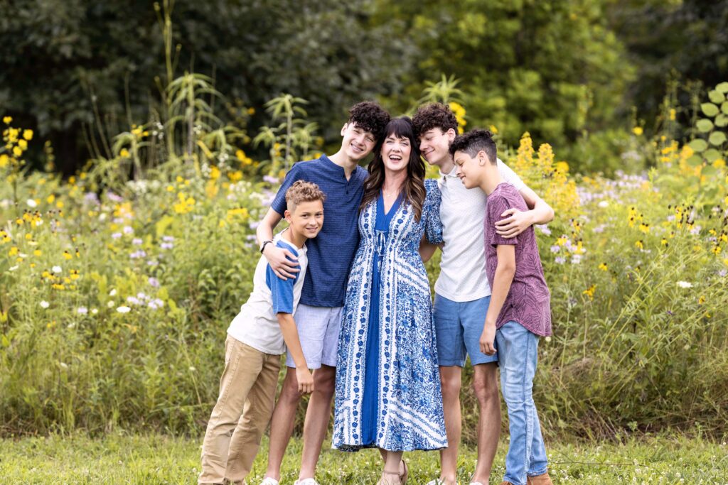 A mom with her 4 boys all hugging. Indianapolis family photographer. 
